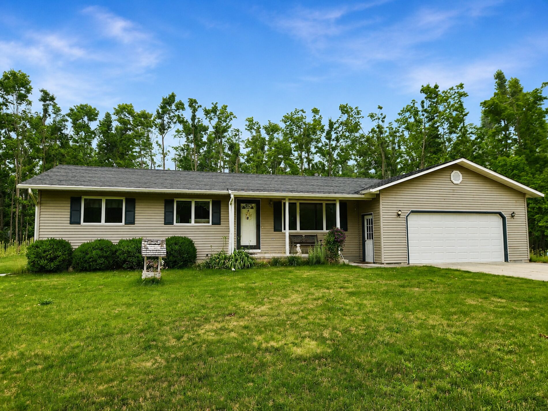11183 Wolf Rd, Johannesburg, MI — front elevation