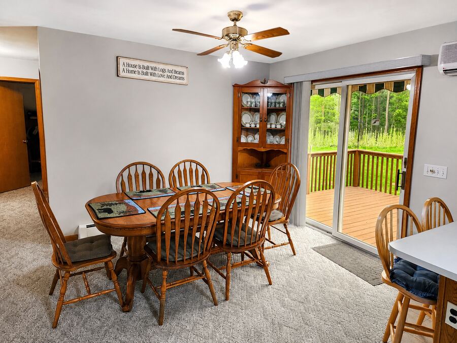 Dining area with slider to the deck