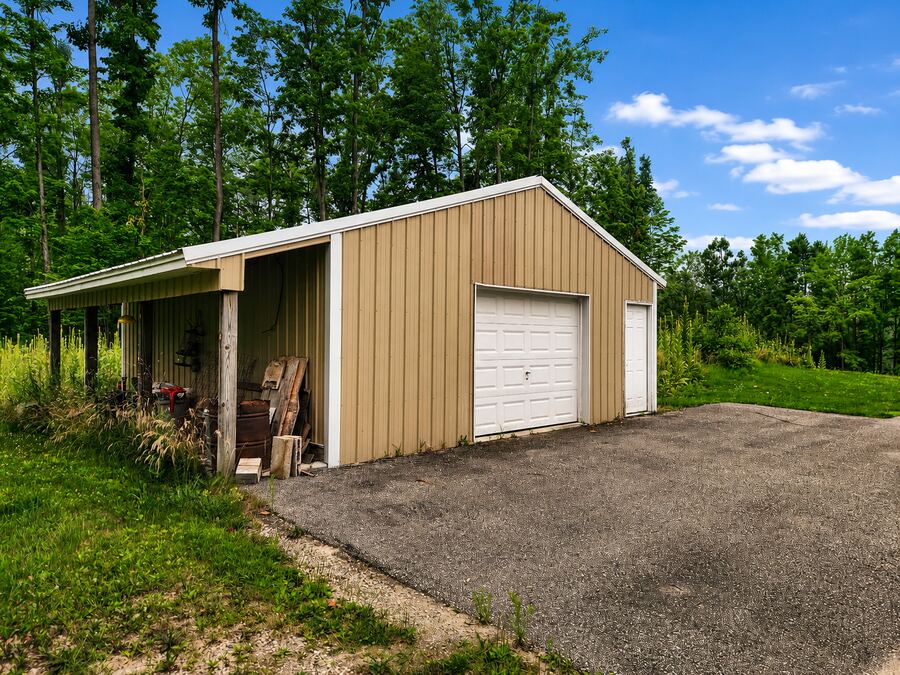 Pole barn with covered lean-to